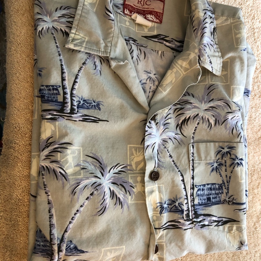 Mens Large RJC Hawaiian shirt with pale green background.